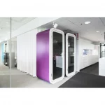 Purple Framery O acoustic booths in office